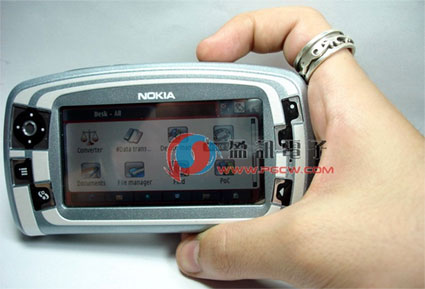 nokia 7710 held in hand